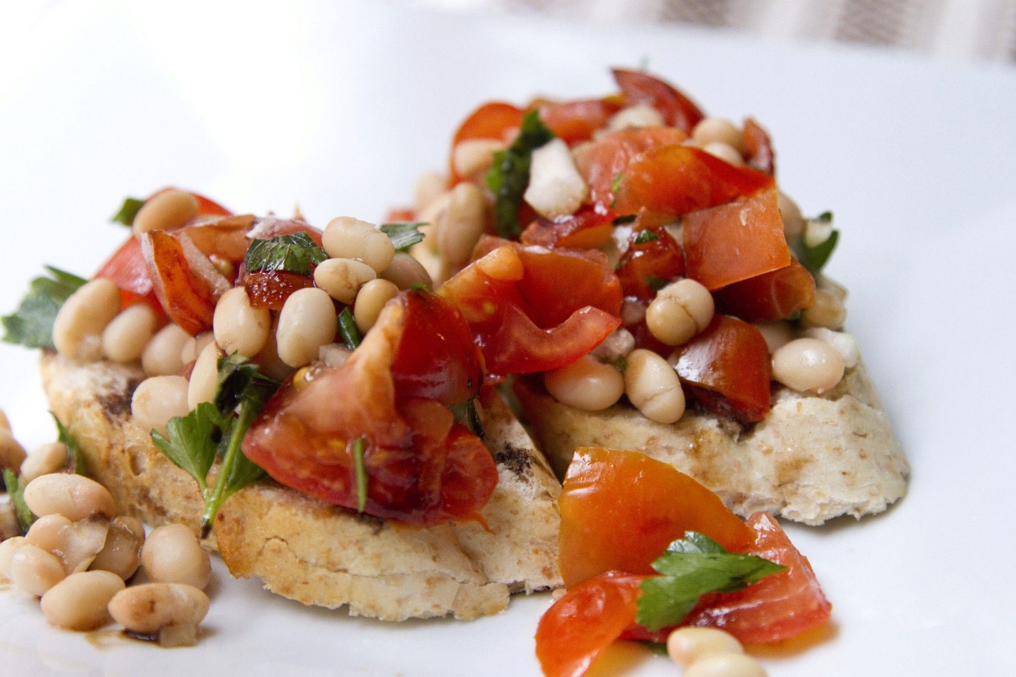 Organic Crispy Bruschetta with White cheddar, Tomatoes, and Olives