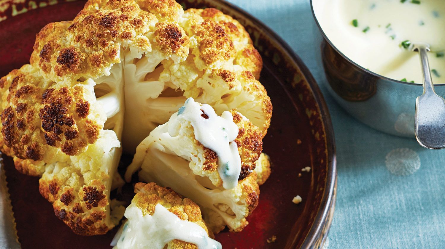 Whole Roasted Cauliflower with Cheddar Sauce