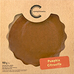 A light brown square pie box with a screen through window showing the top of a Compliments Pumpkin Pie.