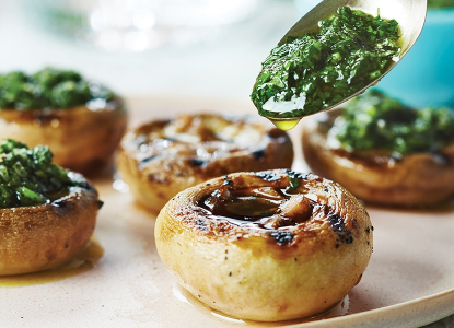 Grilled pesto filled mushrooms